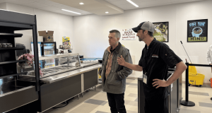 January 29, 2025: Congressman Jared Golden, ME-02, talks with Auburn School Nutrition Director Chris Piercey during tour of Edward Little High School.