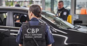 Stock photograph of a Customs and Border Protection (CBP) officer at a port of entry. 