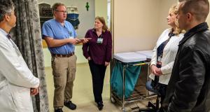 Congressman Golden speaks with hospital staff.