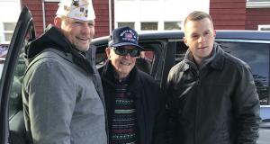 Congressman Golden stands with a veteran.