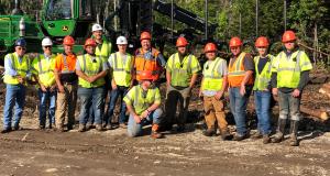 Congressman Jared Golden with a group of loggers.