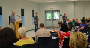 Congressman Jared Golden speaks at a town hall.