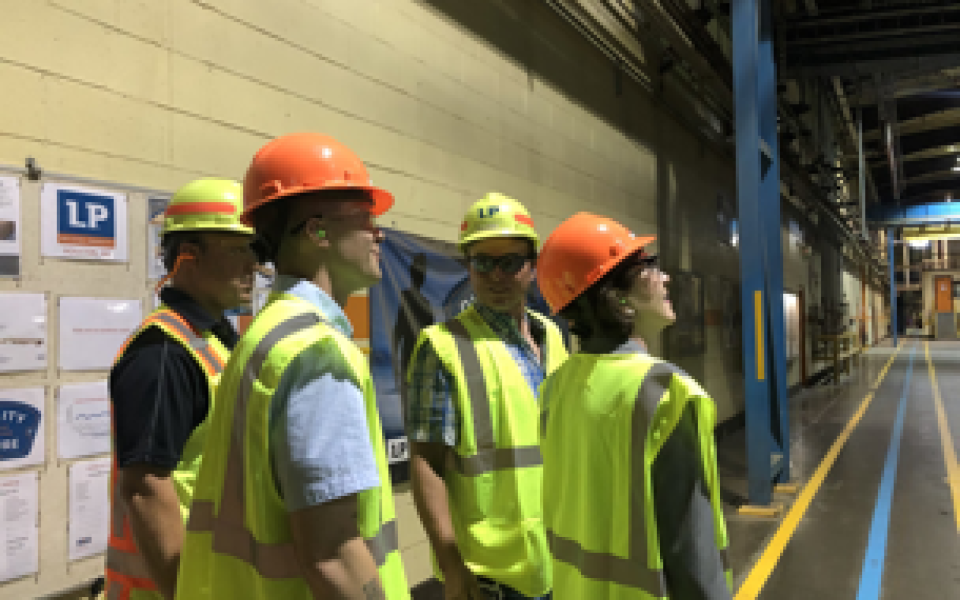 Congressman Jared Golden with workers.