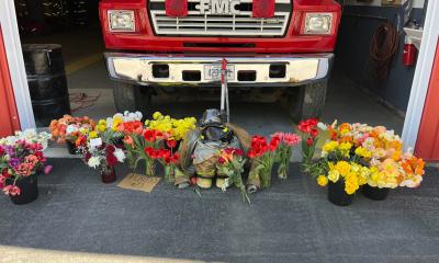 Memorial for firefighter Andrew Cross outside of the Morrill Volunteer Fire Department on Saturday morning. (Dylan Tusinski/Portland Press Herald)