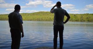 Congressman Jared Golden looks out over the water.