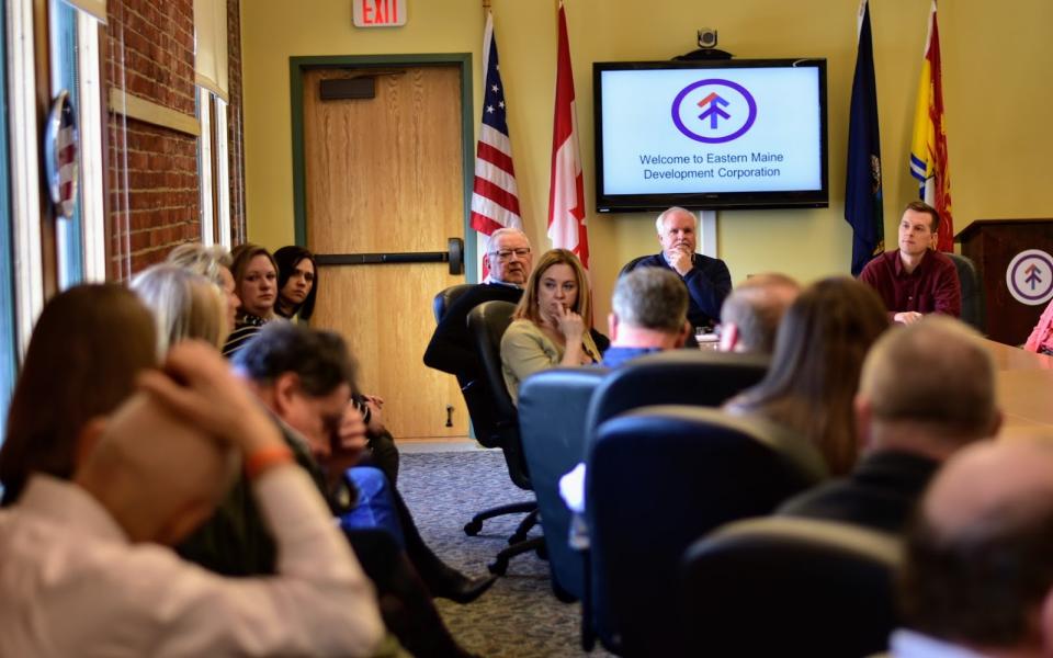 Congressman Jared Golden listens to constituents.