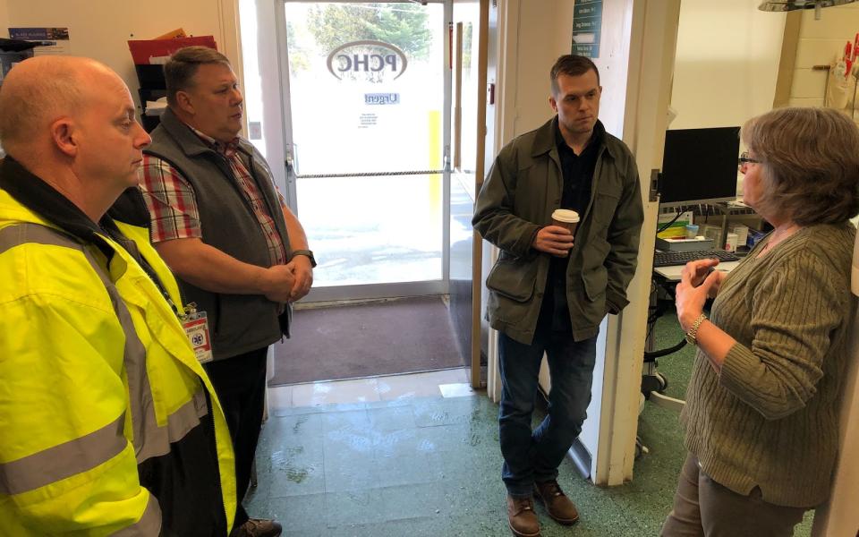 Congressman Jared Golden speaking with constituents.