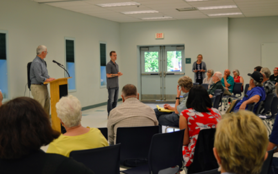 Congressman Jared Golden speaks at a town hall.