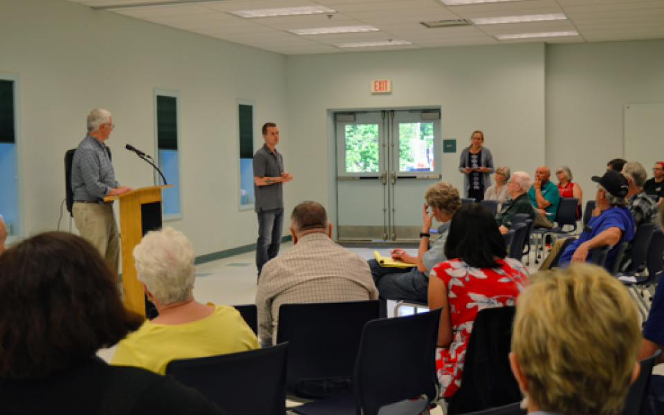 Congressman Jared Golden speaks at a town hall.